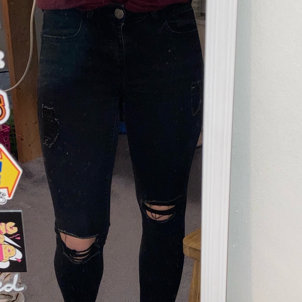 Black high waisted distressed skinny jeans
